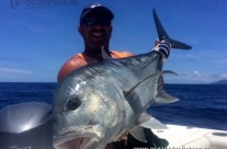 Angler holding huge GT Fish